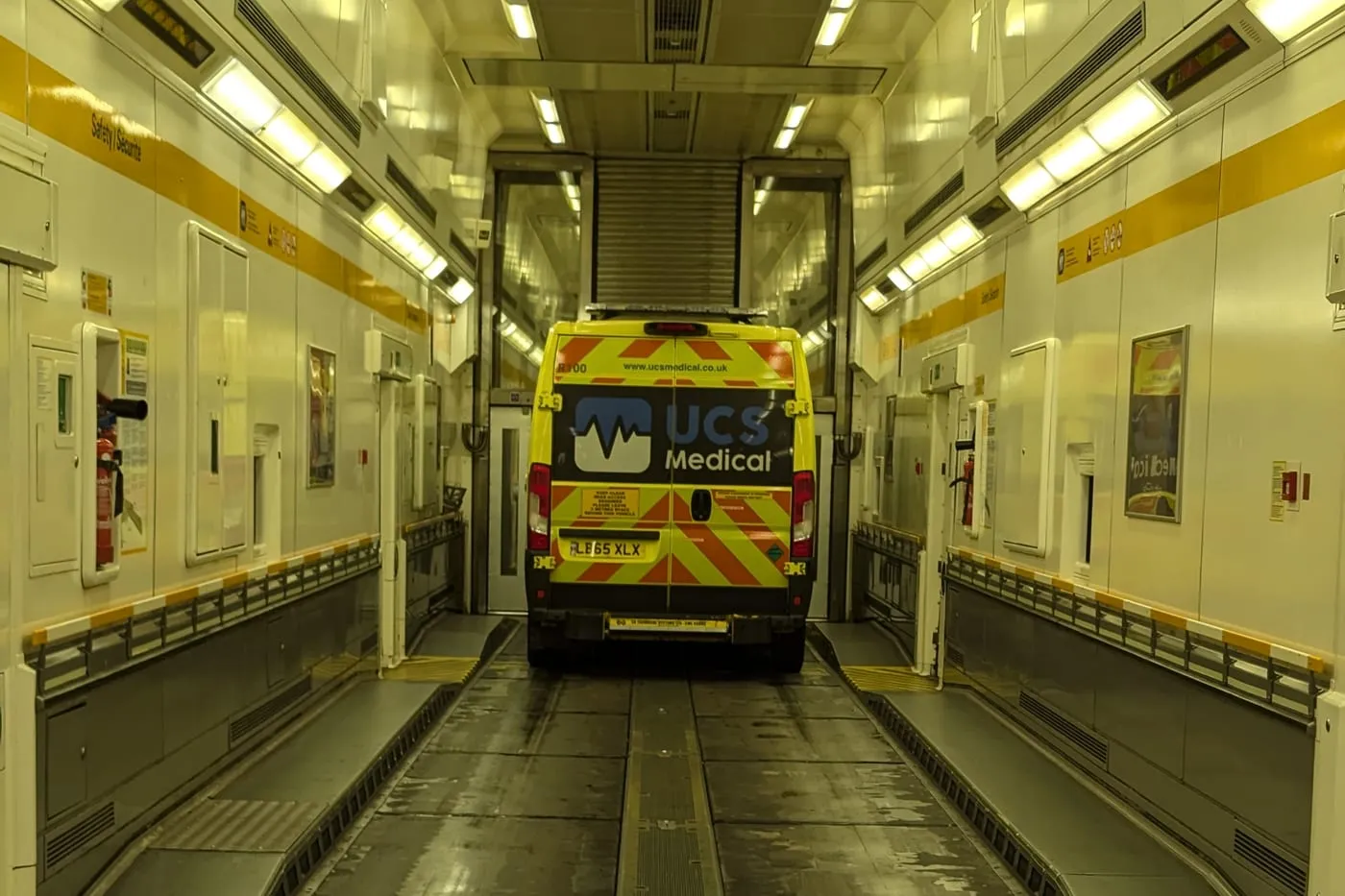An ambulance secured inside a LeShuttle carriage for the crossing, the patient remaining in the same vehicle throughout