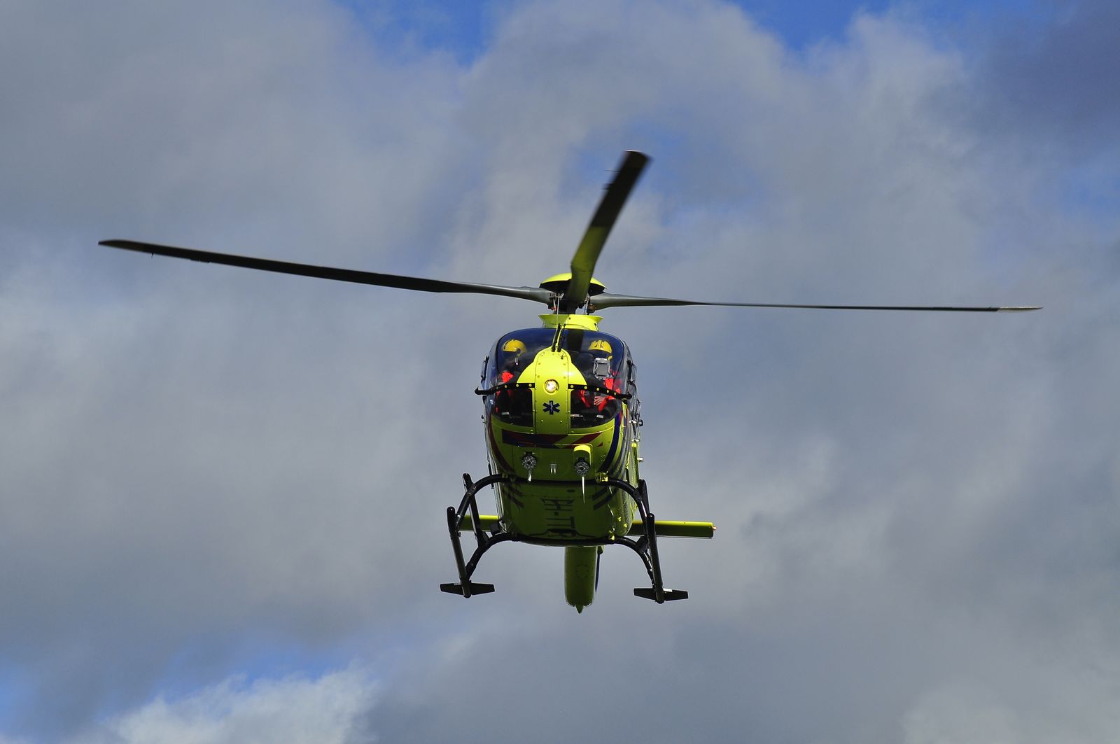 An air ambulance helicopter in flight
